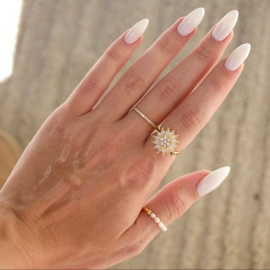 SUN SPINNER WELLNESS RING GOLD