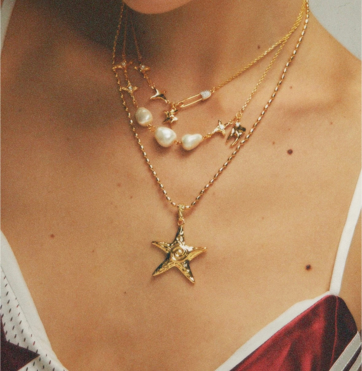 AURA STAR NECKLACE GOLD