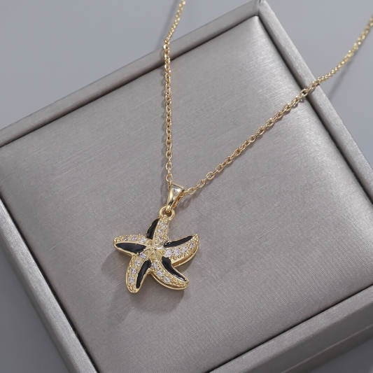 STAR SPINNER WELLNESS NECKLACE GOLD BLACK