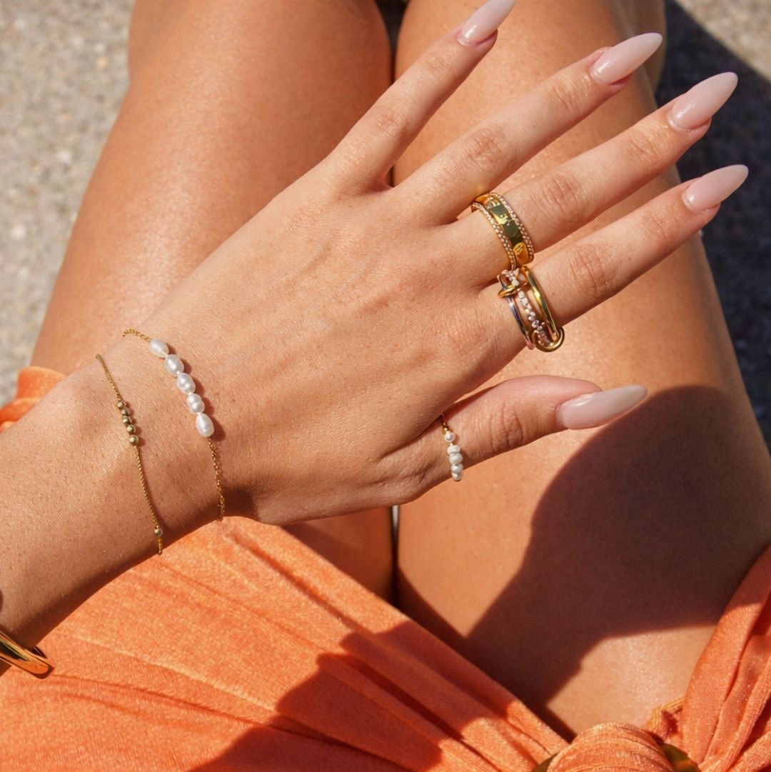 PEACE ROTATING WELLNESS RING GOLD