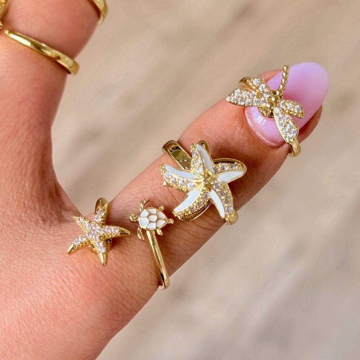 STAR SPINNER WELLNESS RING GOLD WHITE
