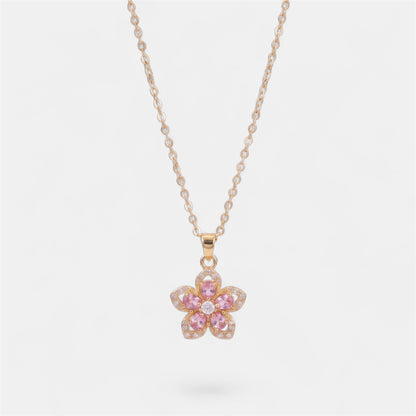 FLOWER SPINNER WELLNESS NECKLACE GOLD PINK