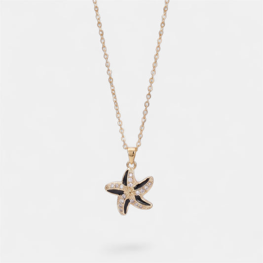 STAR SPINNER WELLNESS NECKLACE GOLD BLACK