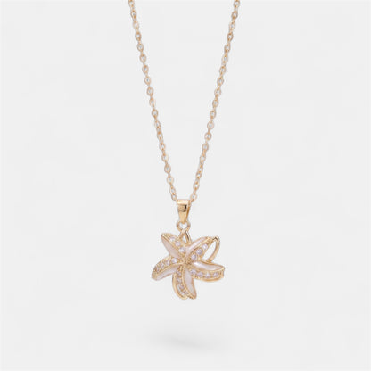 STAR SPINNER WELLNESS NECKLACE GOLD WHITE