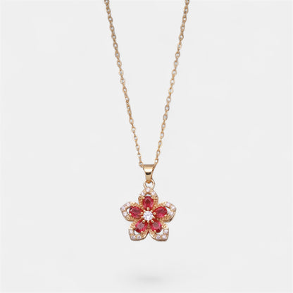 FLOWER SPINNER WELLNESS NECKLACE GOLD RED