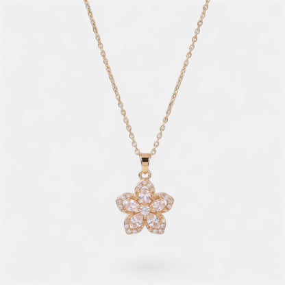 FLOWER SPINNER WELLNESS NECKLACE GOLD WHITE