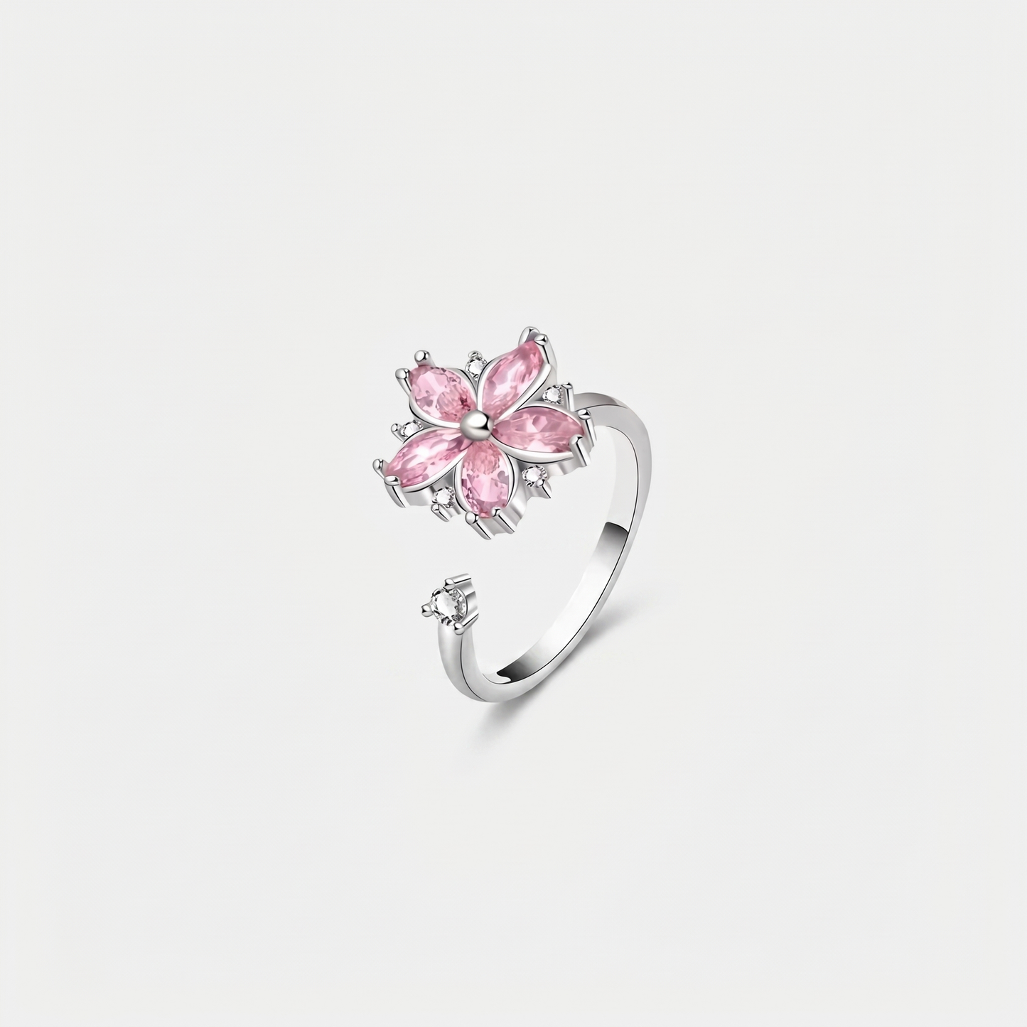 FLOWER SPINNER WELLNESS RING SILVER PINK