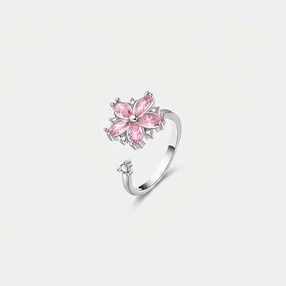 FLOWER SPINNER WELLNESS RING SILVER PINK