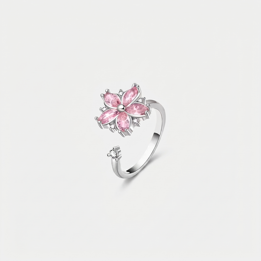 FLOWER SPINNER WELLNESS RING SILVER PINK