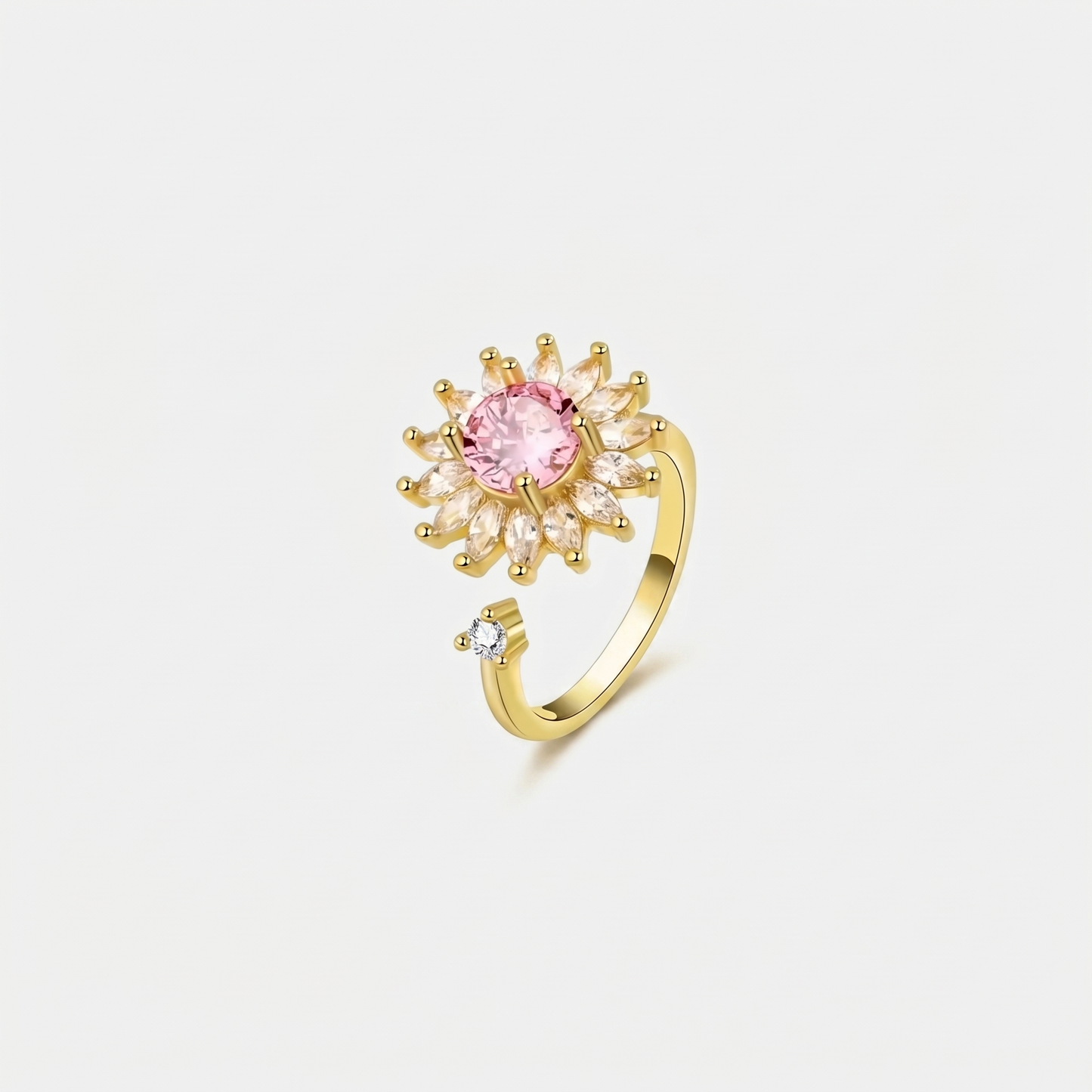 SUN SPINNER WELLNESS RING GOLD PINK
