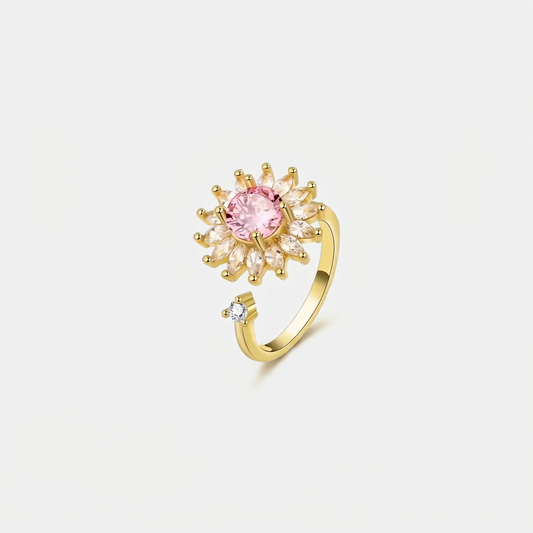 SUN SPINNER WELLNESS RING GOLD PINK