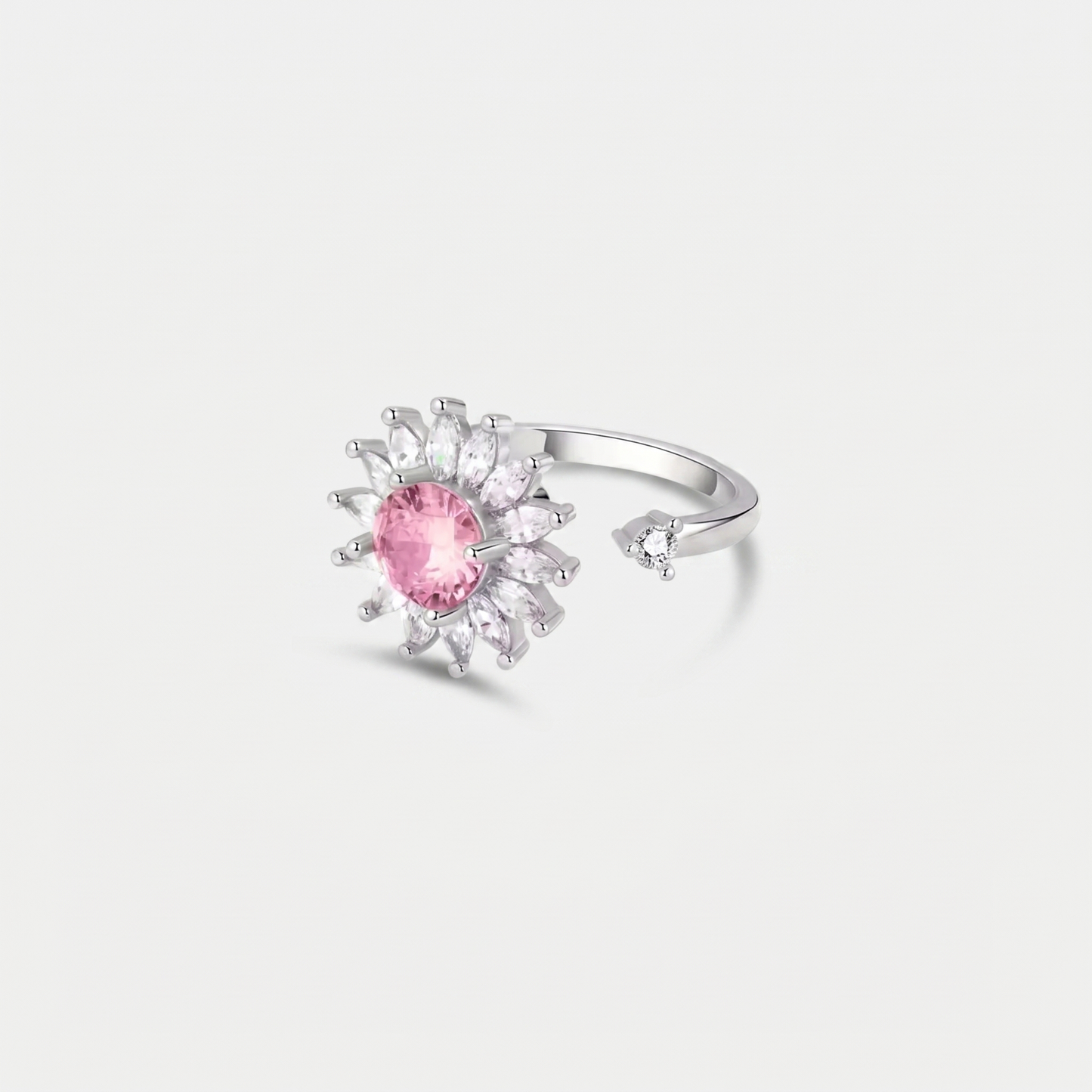 SUN SPINNER WELLNESS RING SILVER PINK