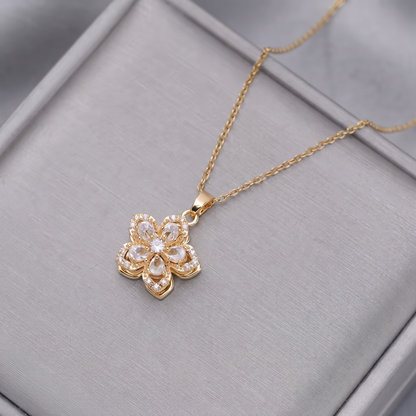 FLOWER SPINNER WELLNESS NECKLACE GOLD WHITE
