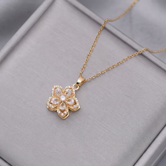 FLOWER SPINNER WELLNESS NECKLACE GOLD WHITE