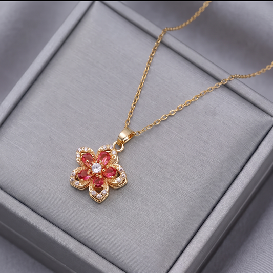 FLOWER SPINNER WELLNESS NECKLACE GOLD RED