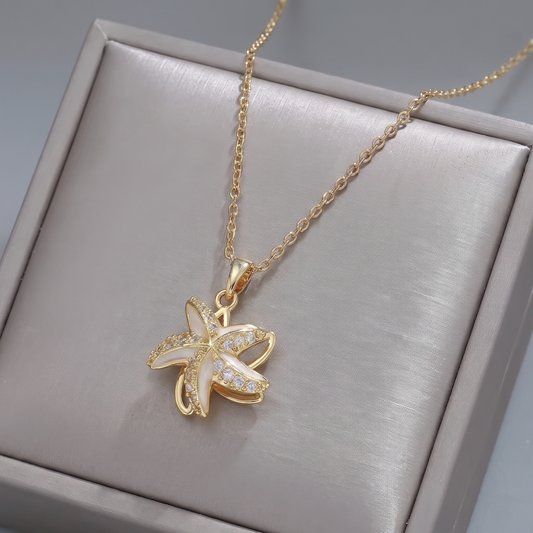 STAR SPINNER WELLNESS NECKLACE GOLD WHITE