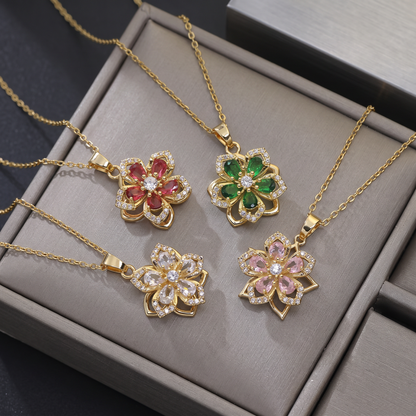 FLOWER SPINNER WELLNESS NECKLACE GOLD PINK