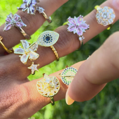 FLOWER SPINNER WELLNESS RING SILVER PINK