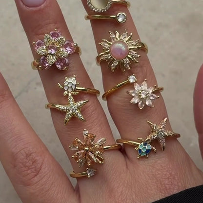 FLOWER SPINNER WELLNESS RING GOLD