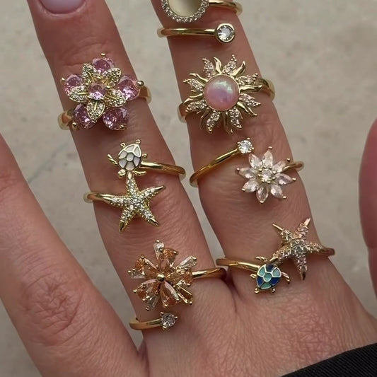 FLOWER SPINNER WELLNESS RING GOLD