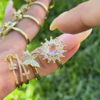 SUN SPINNER WELLNESS RING GOLD PINK