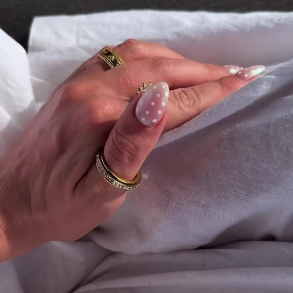 SUN SPINNER WELLNESS RING GOLD